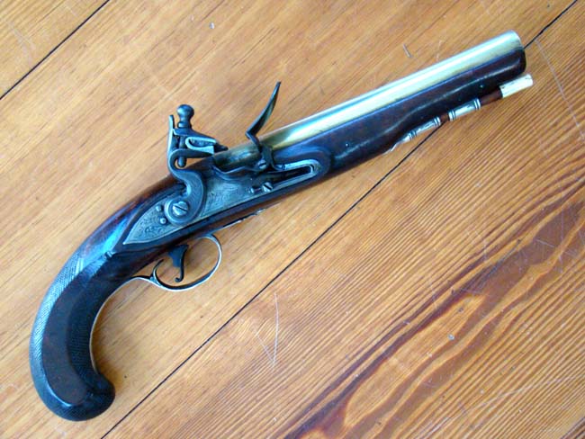 An 18th century English silver mounted flintlock officers' pistol by William Wilson, London 1783